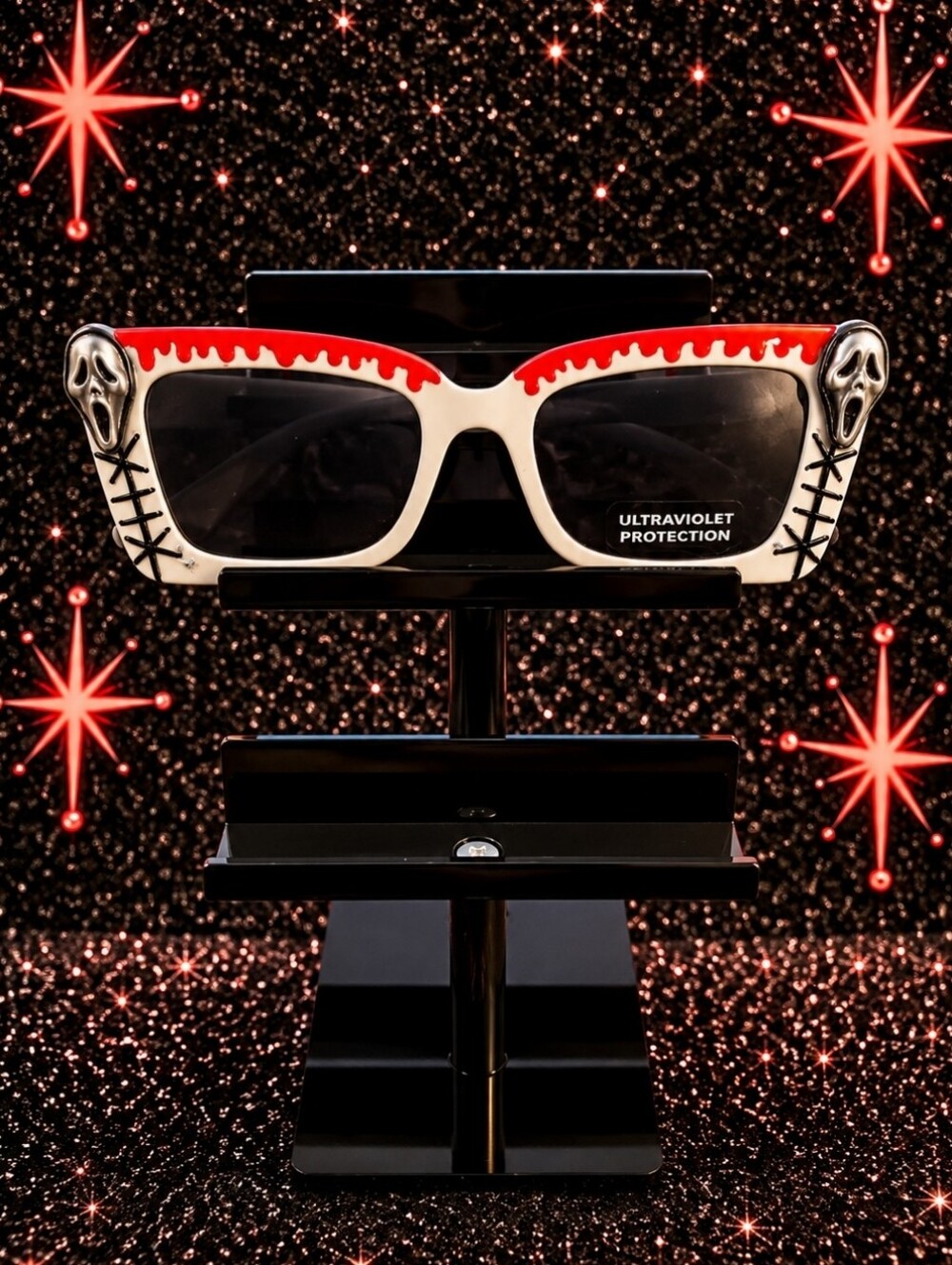 Edgy White & Red Skull Accent Sunglasses with UV Protection